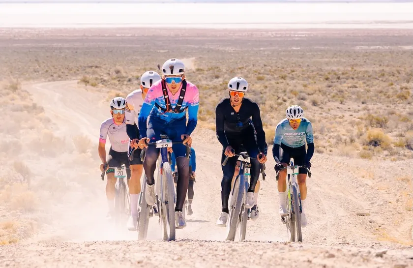 Cyclists racing through desert terrain in an action sports image tied to Steve Z Photography